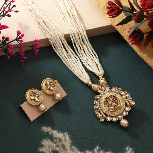 Classic Gold Color Matte Gold Necklace Set Adorned With Traditional Temple Inspired Craft