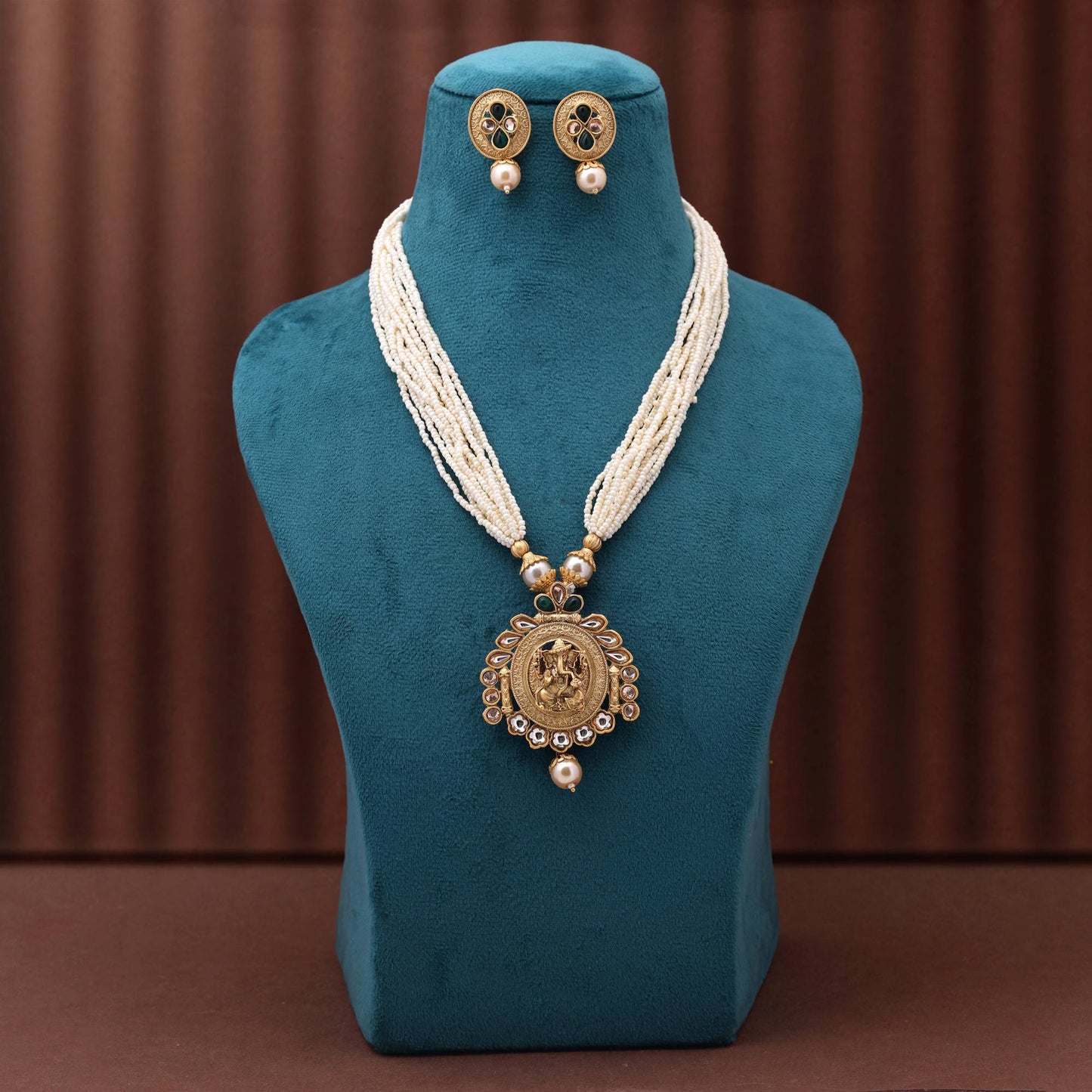 Modern Green Color Matte Gold Necklace Set Featuring Meenakari Work And Floral Embellishments
