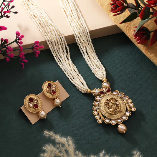 Lovely Rani Color Matte Gold Necklace Set Designed With Intricate Handcrafted Ethnic Patterns