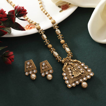 Grand Gold Color Matte Gold Necklace Set With Antique Look And Fine Stone Detailing