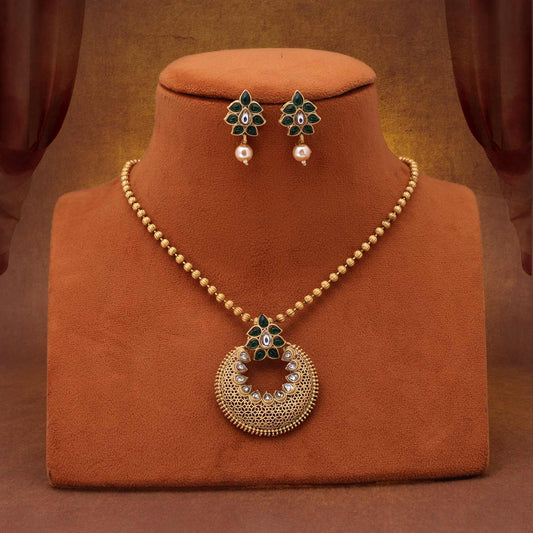Gorgeous Green Color Matte Gold Necklace Set Crafted With Kundan Stones And Artistic Embellishments