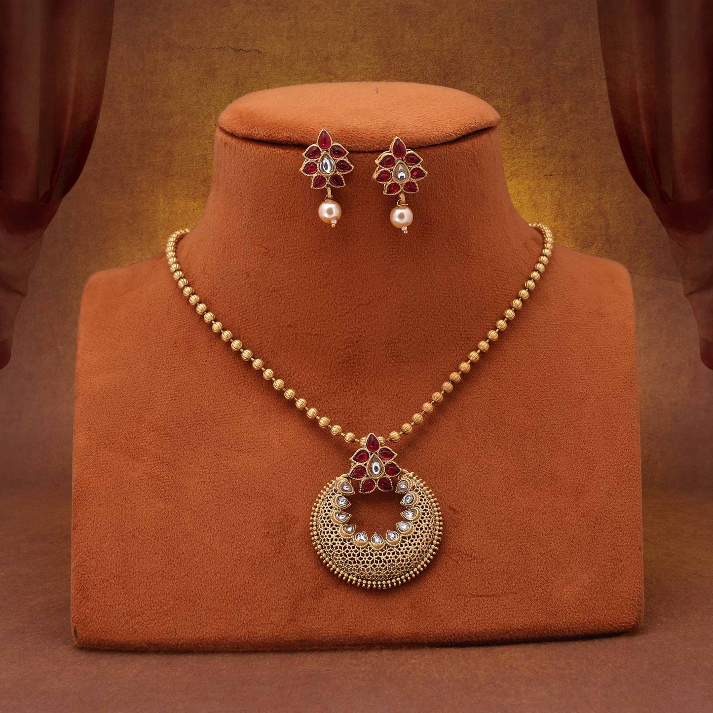 Beautiful Rani Color Matte Gold Necklace Set With Antique Finish And Meenakari Style Details