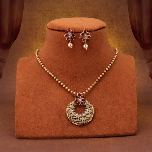 Beautiful Rani Color Matte Gold Necklace Set With Antique Finish And Meenakari Style Details