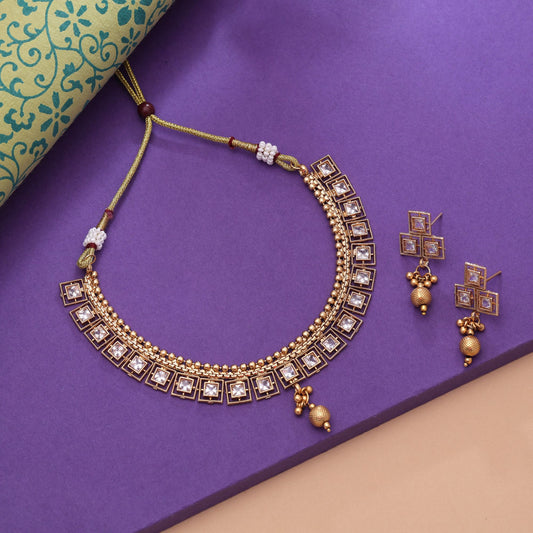 Gold Color Kundan Necklace Set with Ethnic Matte Gold Charm