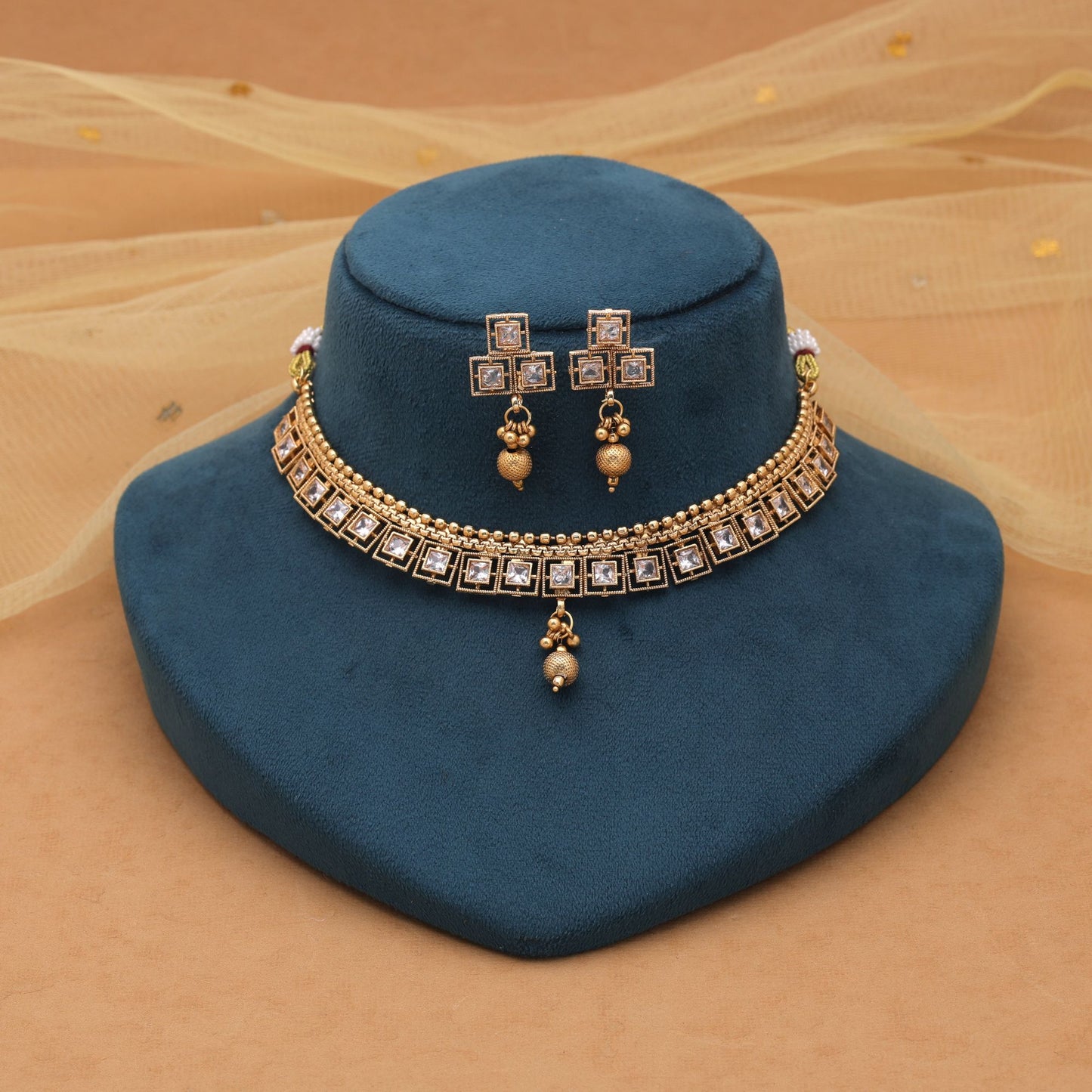 Gold Color Kundan Necklace Set with Ethnic Matte Gold Charm