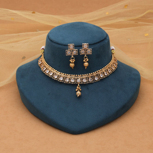 Gold Color Kundan Necklace Set with Ethnic Matte Gold Charm