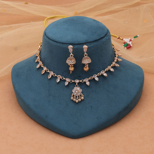 Gold Color Kundan Necklace Set with Festive Matte Gold Design
