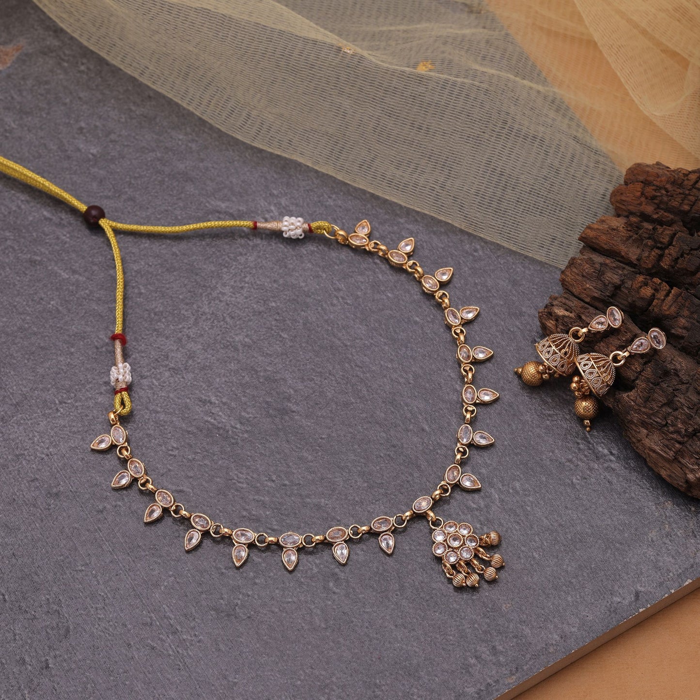 Gold Color Kundan Necklace Set with Festive Matte Gold Design