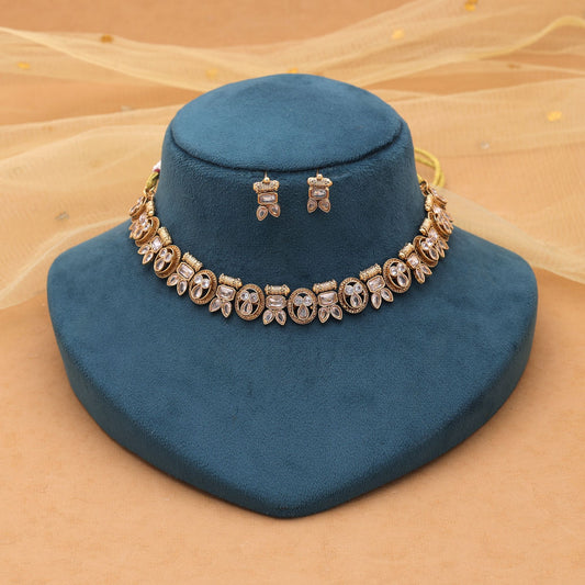 Gold Color Kundan Necklace Set with Elegant Ethnic Appeal