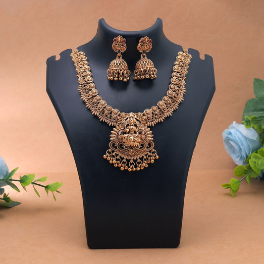 Gold Color Temple Necklace Set Crafted with Beautiful Traditional Artwork Details