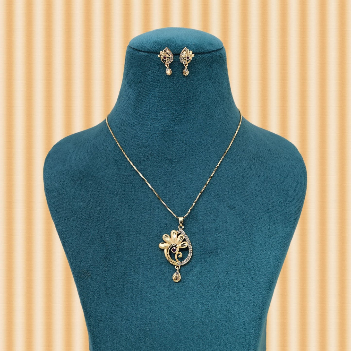 Gold Color Chain Pendant With Earring Offering Polished Look For Festive Celebrations