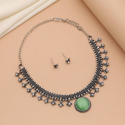 Pista Green Color Oxidised Necklace Set Featuring Classic Tribal Artwork