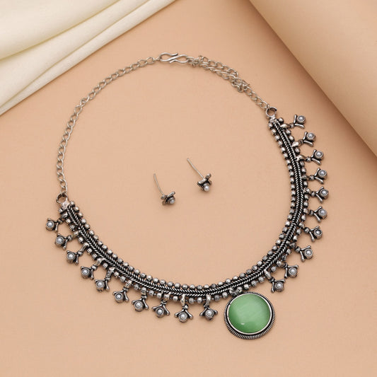 Pista Green Color Oxidised Necklace Set Featuring Classic Tribal Artwork