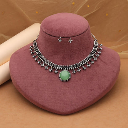 Pista Green Color Oxidised Necklace Set Featuring Classic Tribal Artwork