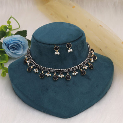 Black Color Dual Tone Oxidised Necklace Set Featuring Traditional Artwork