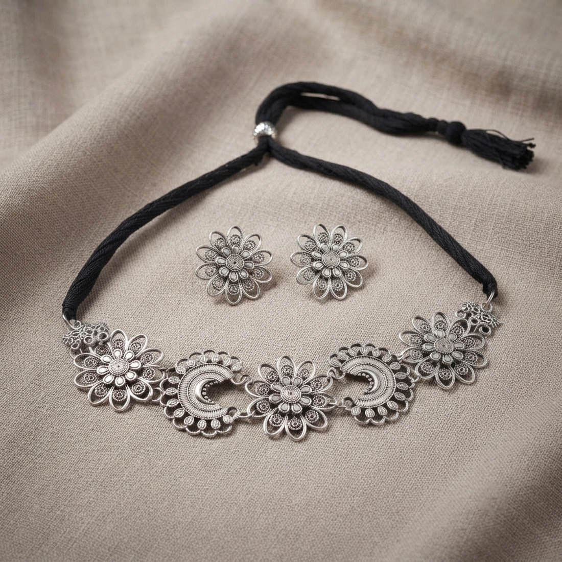 Charming Silver Color Floral Shape Oxidised Necklace Set with Matching Jhumkis