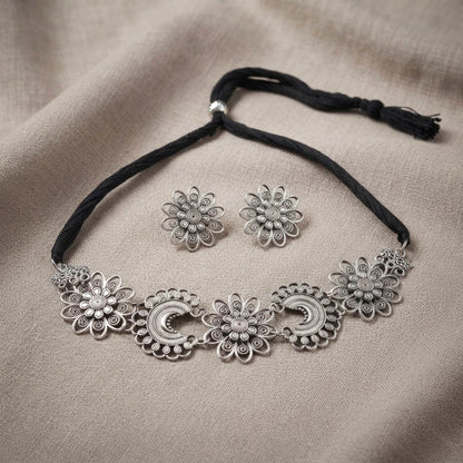 Charming Silver Color Floral Shape Oxidised Necklace Set with Matching Jhumkis