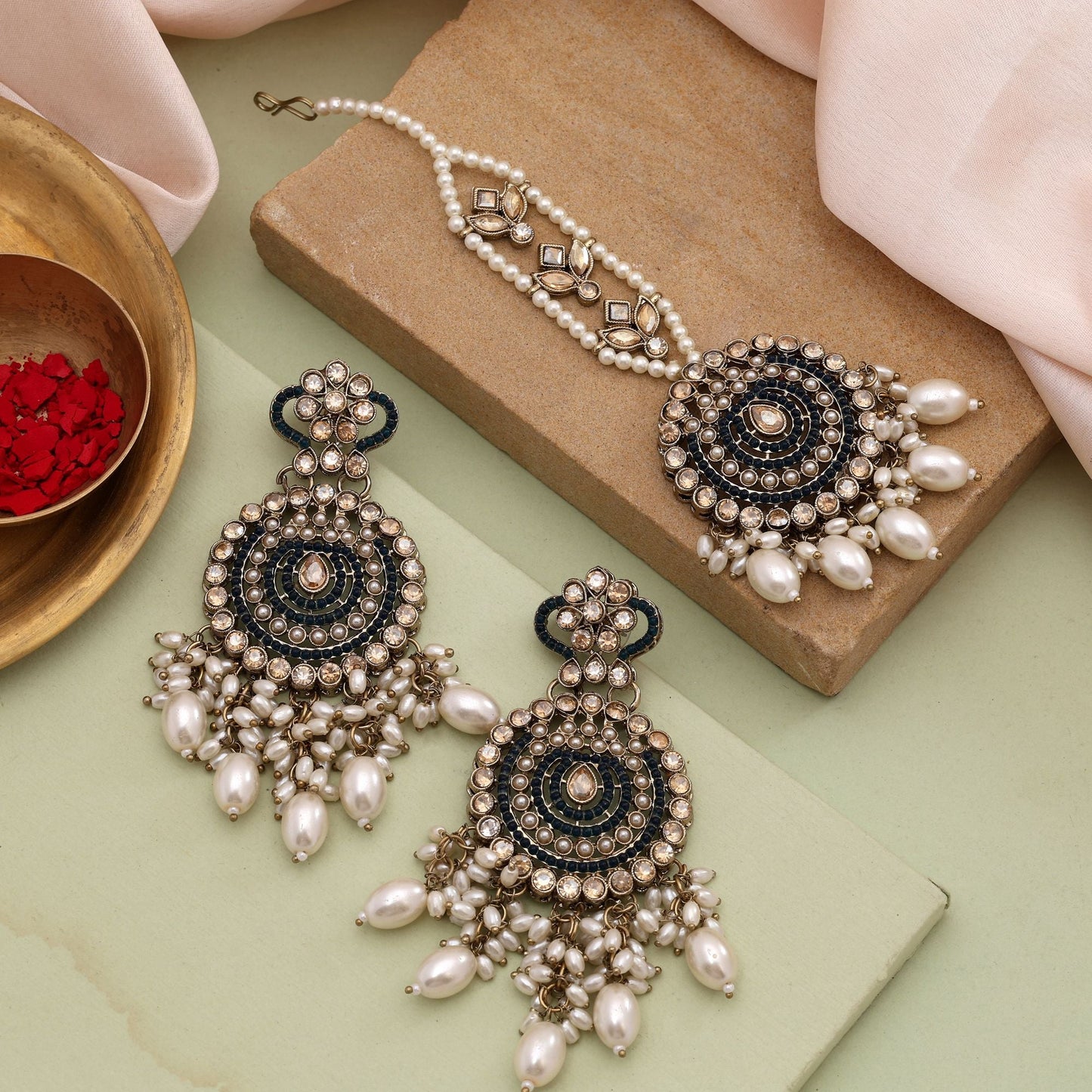 Graceful Green Color Kundan Earrings Tikka Set Perfect For Every Occasion