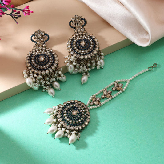 Radiant Rama Green Color Kundan Earrings Tikka Set For Festive And Bridal Look