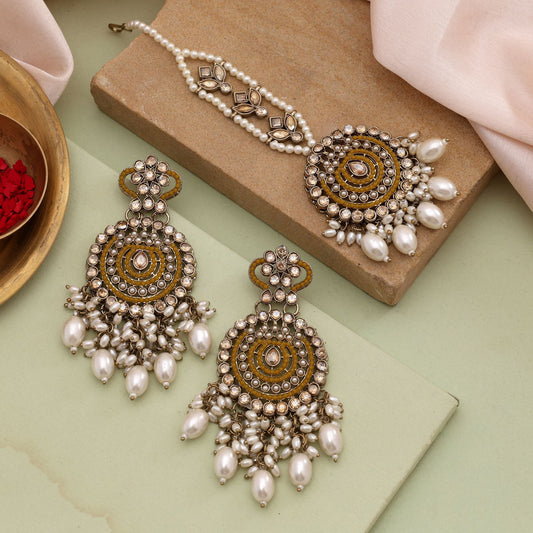 Bright Yellow Color Kundan Earrings Tikka Set Ideal For Festive And Casual Wear
