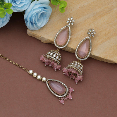 Charming Light Pink Color Kundan Earrings Tikka Set With Elegant Traditional Artwork