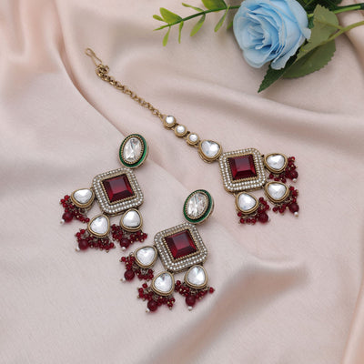 Graceful Maroon Color Kundan Earrings Tikka Set With Antique Bridal Design Finish