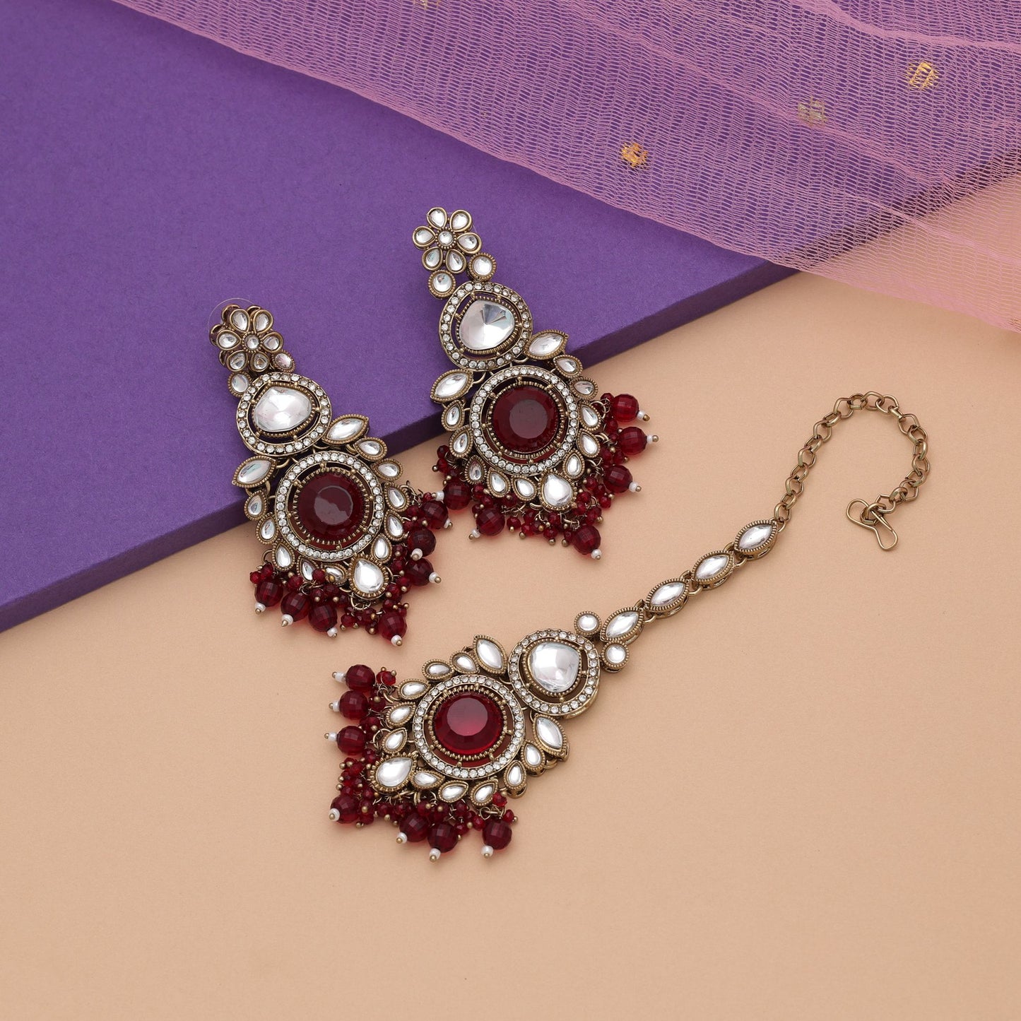 Graceful Maroon Color Kundan Earrings Tikka Set With Premium Wedding Finish Design