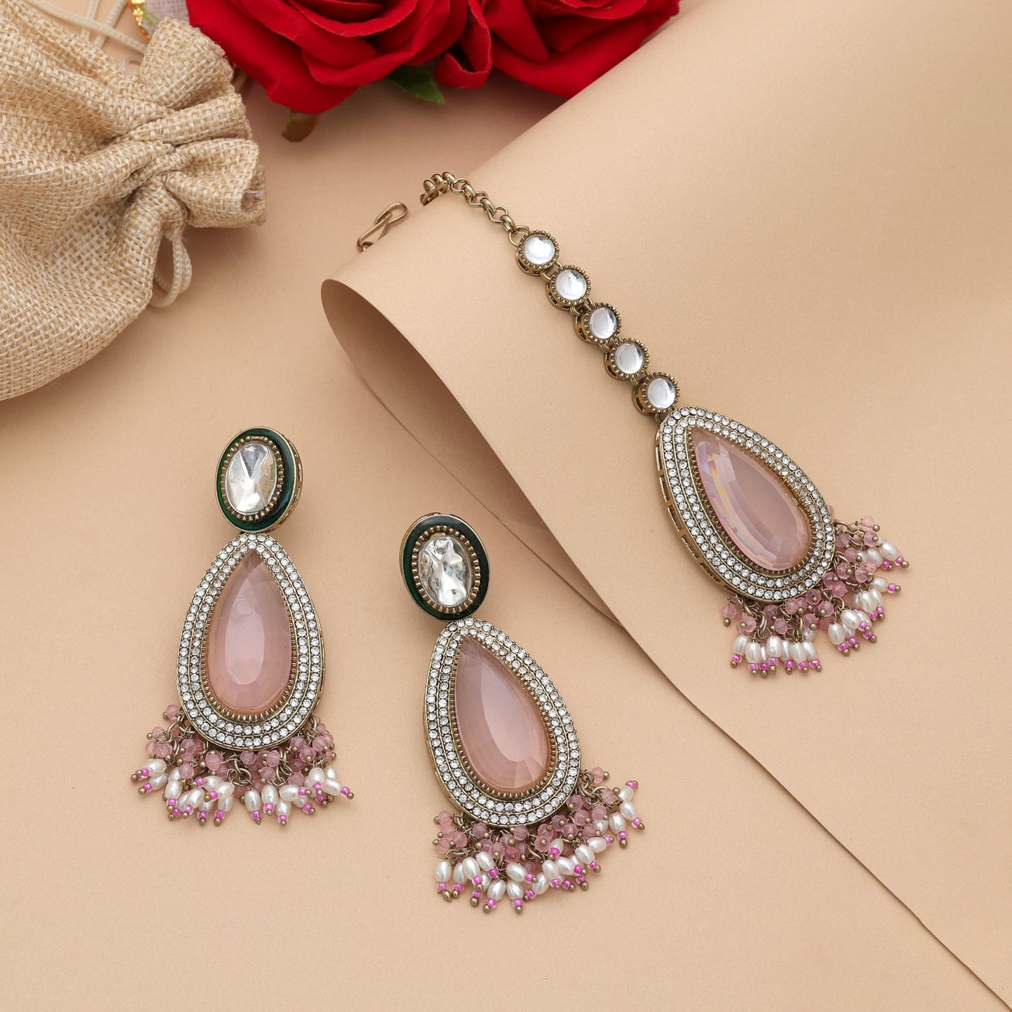 Stylish Light Pink Color Kundan Earrings Tikka Set With Bridal Traditional Artwork