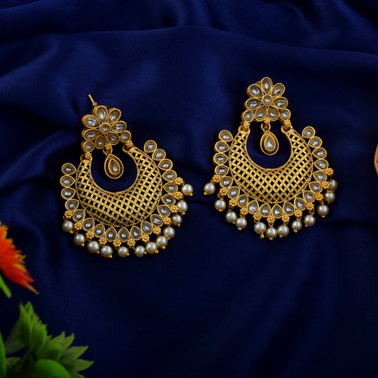 Elegant Gold Color Matte Gold Earrings With Kundan And Stone Detailing