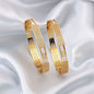 Goldfarbenes Mode-Armreif-Paar (PLKB150GLD)