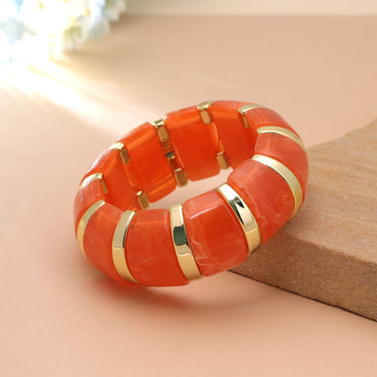 Orange Color Stretchable Acrylic Fashion Bangle Featuring Modern Design Appeal