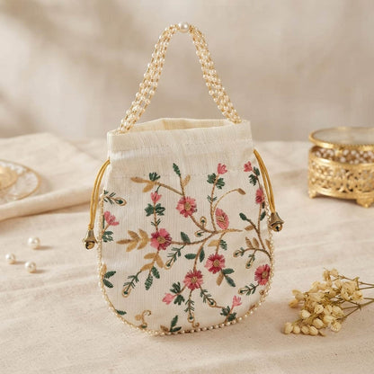 Elegant Off White Color Pearls Handwork Silk Potli Bag For Weddings