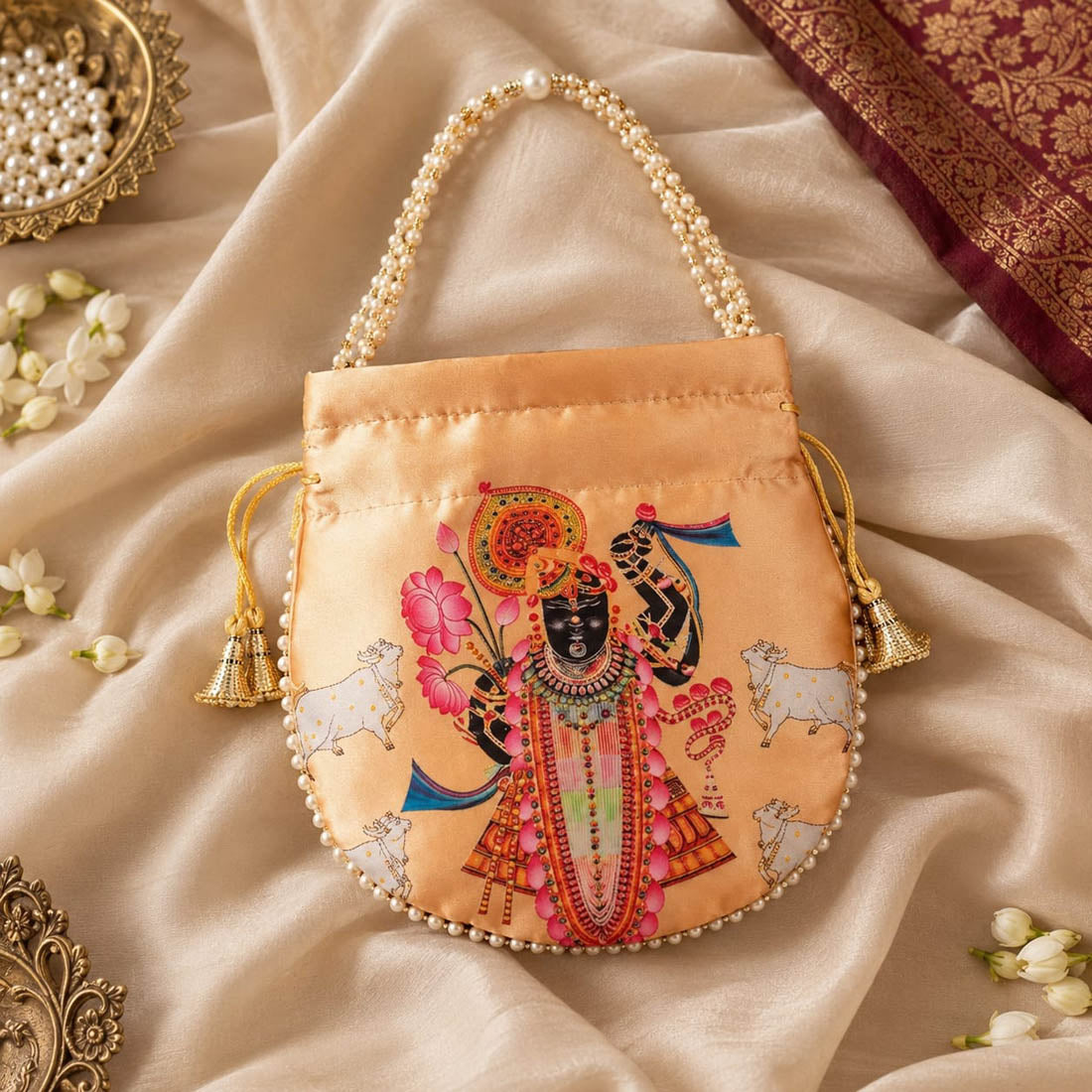 Charming Peach Color Pearls Shree Nath ji Handwork Silk Potli Bag For Brides