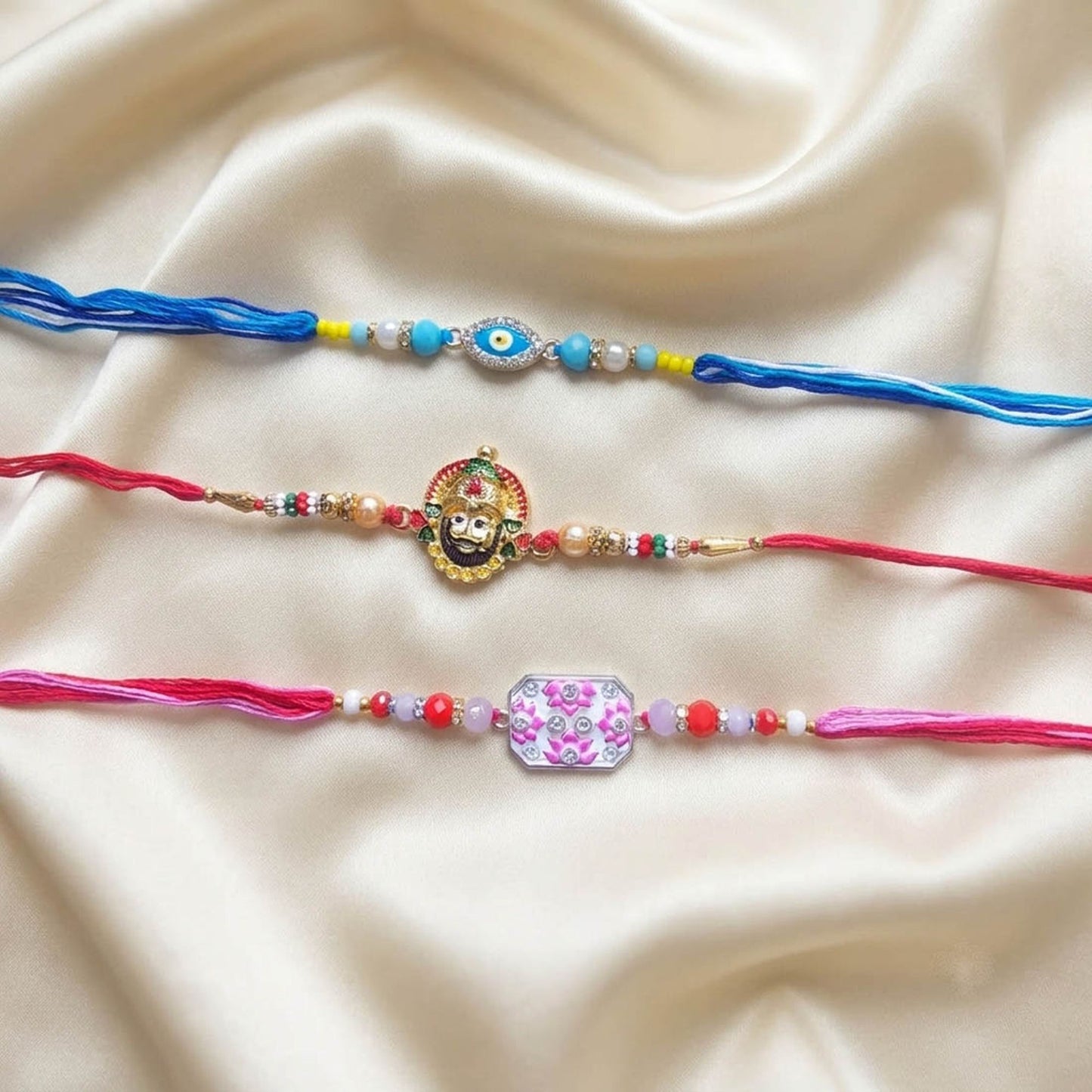Multi Color Set of 3 Thread Rakhis with Stylish Beaded Raksha Bandhan Appeal