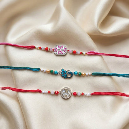 Multi Color Set of 3 Thread Rakhis Crafted with Attractive Traditional Decorative Finish