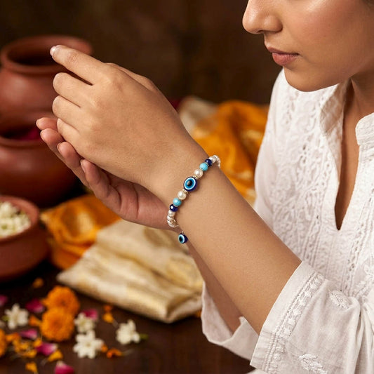 Blue & White Color Set of 12 Bracelet Rakhis with Elegant Traditional Design