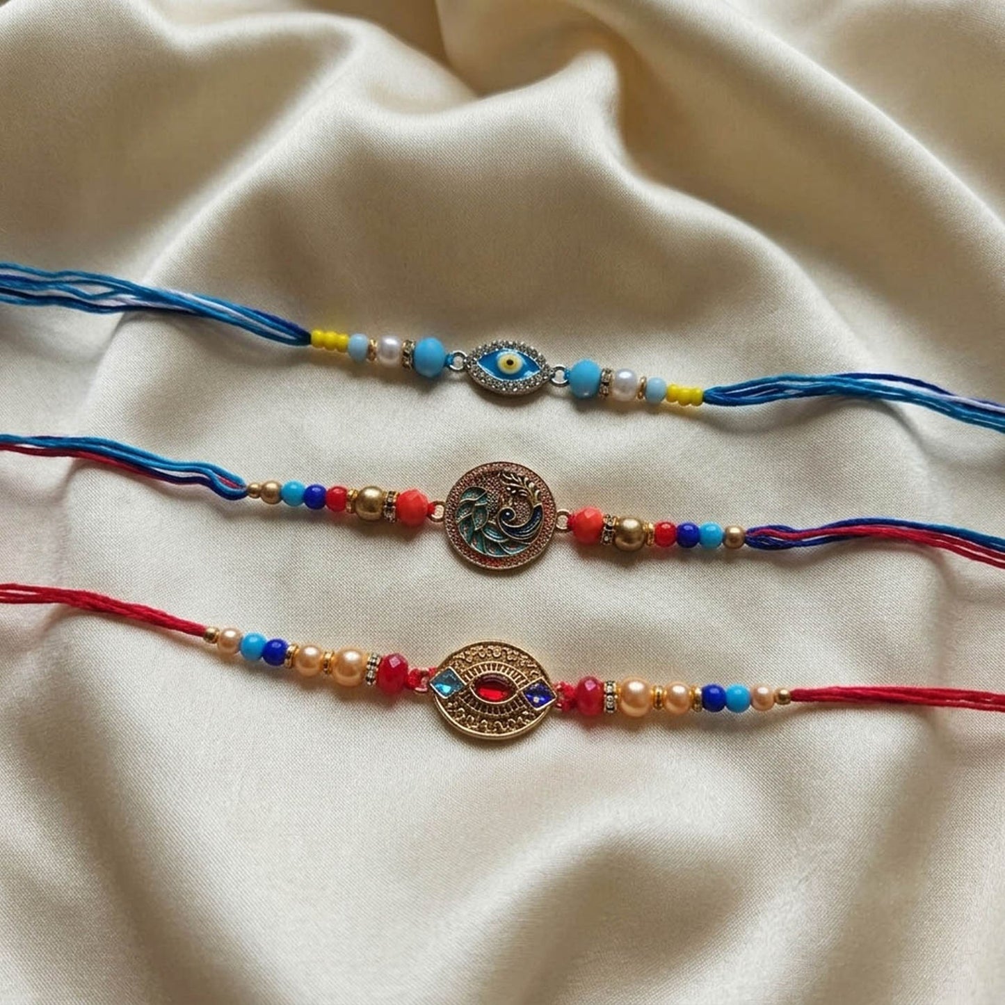 Multi Color Set of 3 Thread Rakhis with Elegant Traditional Handmade Design for Raksha Bandhan Celebration