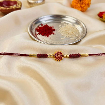 12 Pieces Combo Multi Color Om Design Religious Thread Rakhis Featuring Divine Symbol and Traditional Craftsmanship